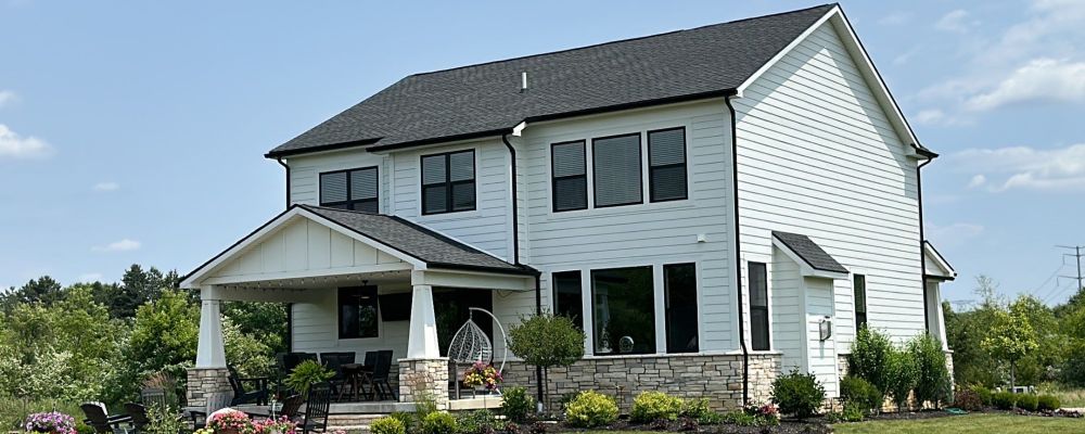 Roof tear-off removing hail damaged materials in Pinckney Michigan